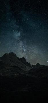 Astrophotography picture of landscape with milky way on the night sky.