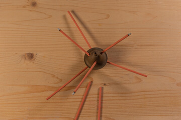 Scented diffusers on dispenser on wooden background