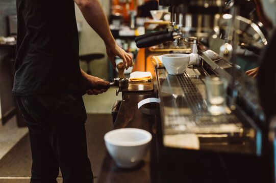 Barista Tamping Grinds