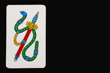 Ace of spades of the Neapolitan playing cards on a black background