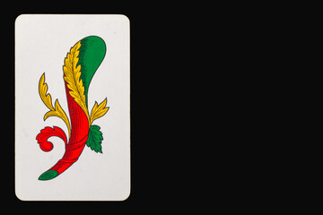 Ace of stick of the Neapolitan playing cards on a black background