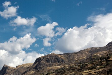 Fototapeta na wymiar Blue sky and a mountain.