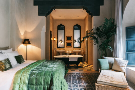 Master Bedroom With Attached Bathroom and Bathtub