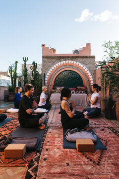 Yoga Namaste on Sunny Rooftop