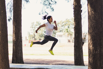Healthy lifestyle young fitness woman running