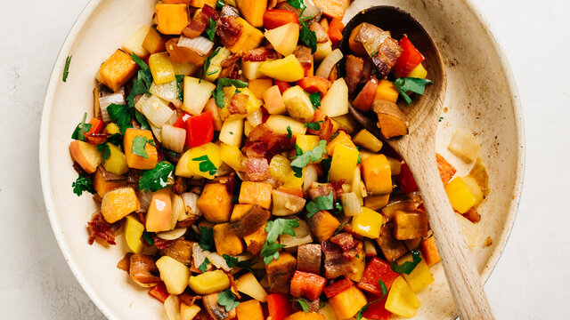 Apple and sweet potato hash in a skillet