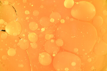 Swirling light yellow neon colors, looking like orange juice