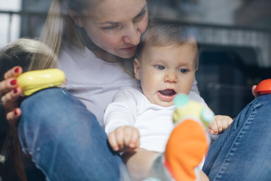 Mother at Home with her Baby Boy