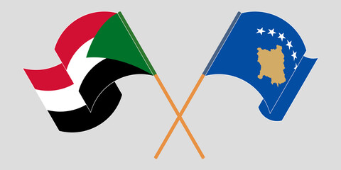 Crossed and waving flags of Kosovo and Sudan