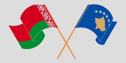 Crossed and waving flags of Kosovo and Belarus