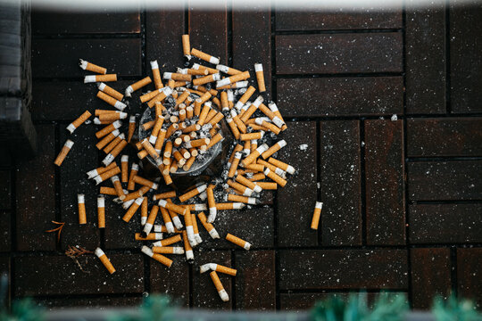 Ashtray Overflowing With Cigarettes