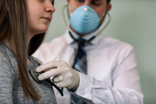Exam: Doctor Uses Stethoscope To Check Teen's Breathing