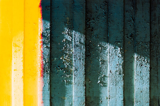 Peeling paint surface background with light leak