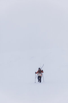 Mountain Skiing in Foggy Lapland
