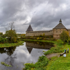 Obraz premium A fortress in the village of Staraya Ladoga on a cape where the Ladozhka River flows into the Volkhov River.