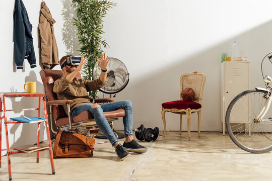 Man With VR Glasses at Home
