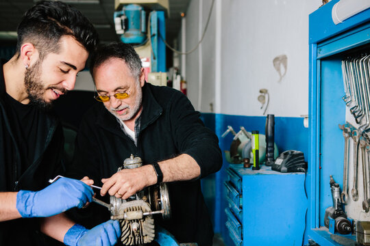 Mechanic and apprentice