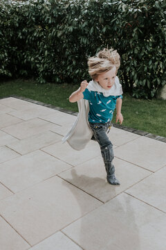 Little blond boy running like the wind