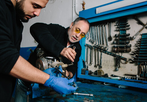 Mechanic and apprentice