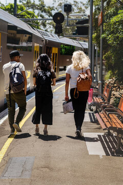 three students at the train station