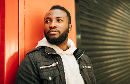 african american man on the red and black background