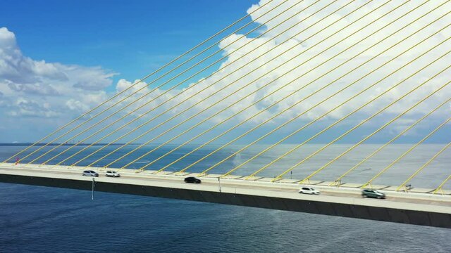 Aerial video Sunshine Skyway steel cable suspension bridge over Tampa Bay Florida