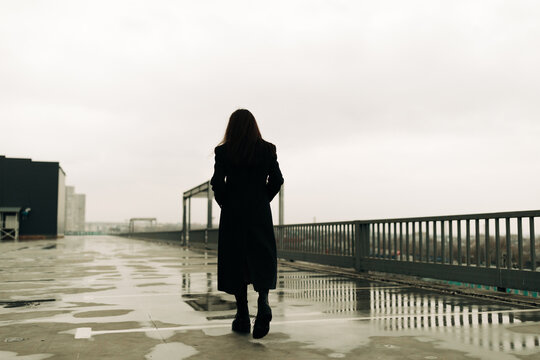woman walking away