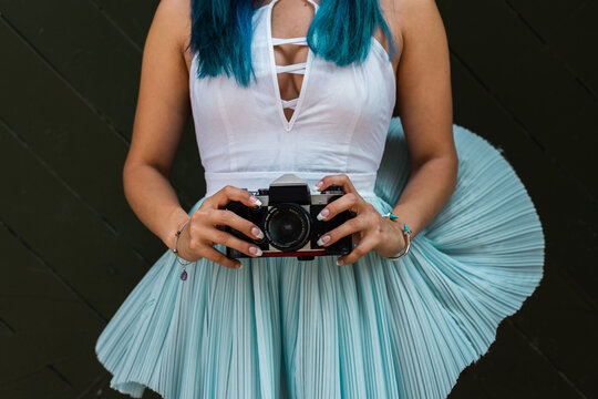 young woman with camera