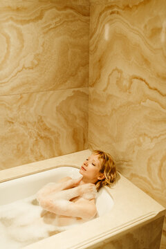 Woman With Short Hair In Bath