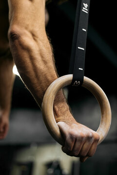 Handsome athlete gym training