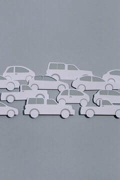 Paper car on grey background
