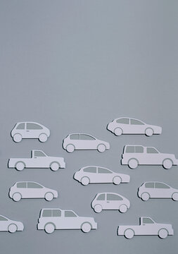 Paper car on grey background
