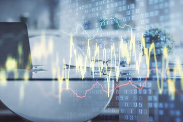 Double exposure of financial graph drawing and office interior background. Concept of stock market.