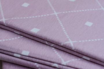 Colorful bed linen, close up, soft cotton textile, home and bedroom decoration 