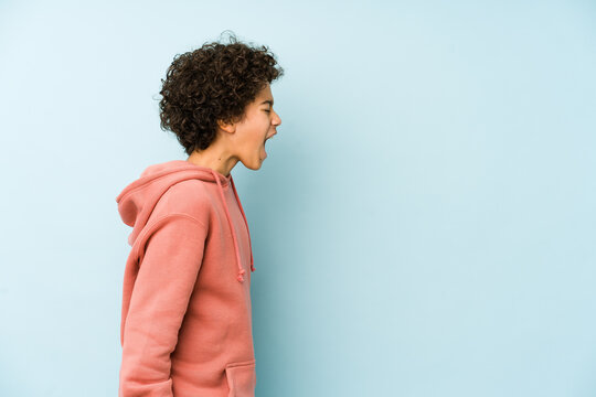 African American Little Boy Isolated Shouting Towards A Copy Space