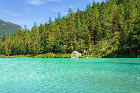 Lake of fairies (Lago delle Fate in Italian) in Macugnaga, Italy against mountains. It is famous for its clear and green water.