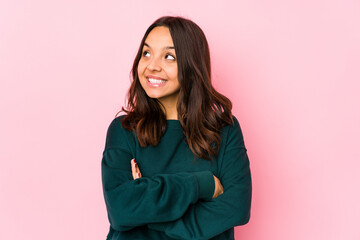 Fototapeta premium Young mixed race hispanic woman isolated smiling confident with crossed arms.