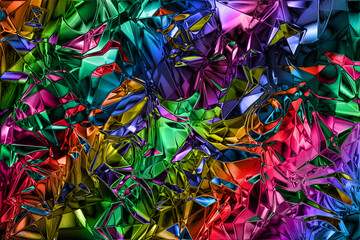 An abstract multicolored wrinkled foil texture background image.