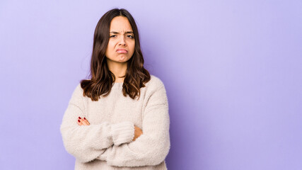 Young mixed race hispanic woman isolated unhappy looking in camera with sarcastic expression.