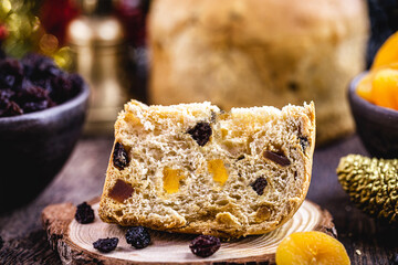 large slice of panettone, typical candied fruit bread, a Brazilian and Italian Christmas dessert
