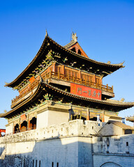 Fototapeta premium Buddhist temple on the city wall of old town of luoyang China