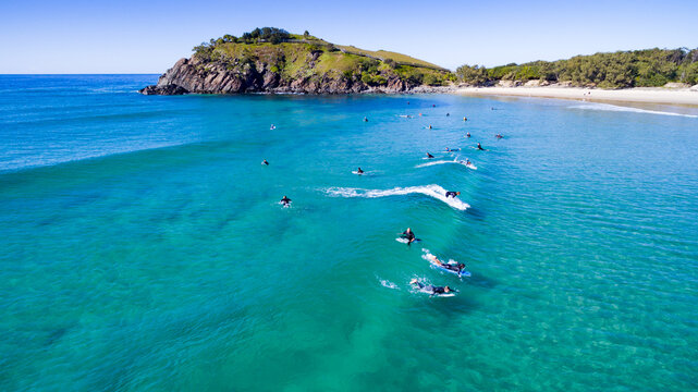 Aerial view of surf and surfers at Cabarita Beach.