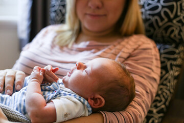Mother nursing new born baby