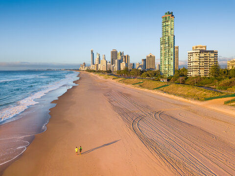 Aerial view of runners on the beach at the Gold Coast