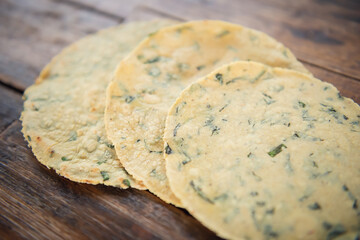 Mexican traditional handmade tortillas. Recently handmade corn tortillas on wooden table. Mexican food