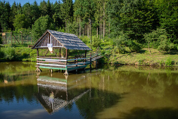 Obraz premium Romania Bistrita Paradisul Verde ,ponton pe lac ,2020