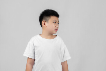 Asian boys studio shot portrait on gray background