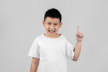 Asian boys studio shot portrait on gray background