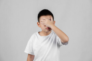 Asian boys studio shot portrait on gray background