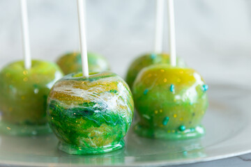 marbled green toffee candy apples on sticks
